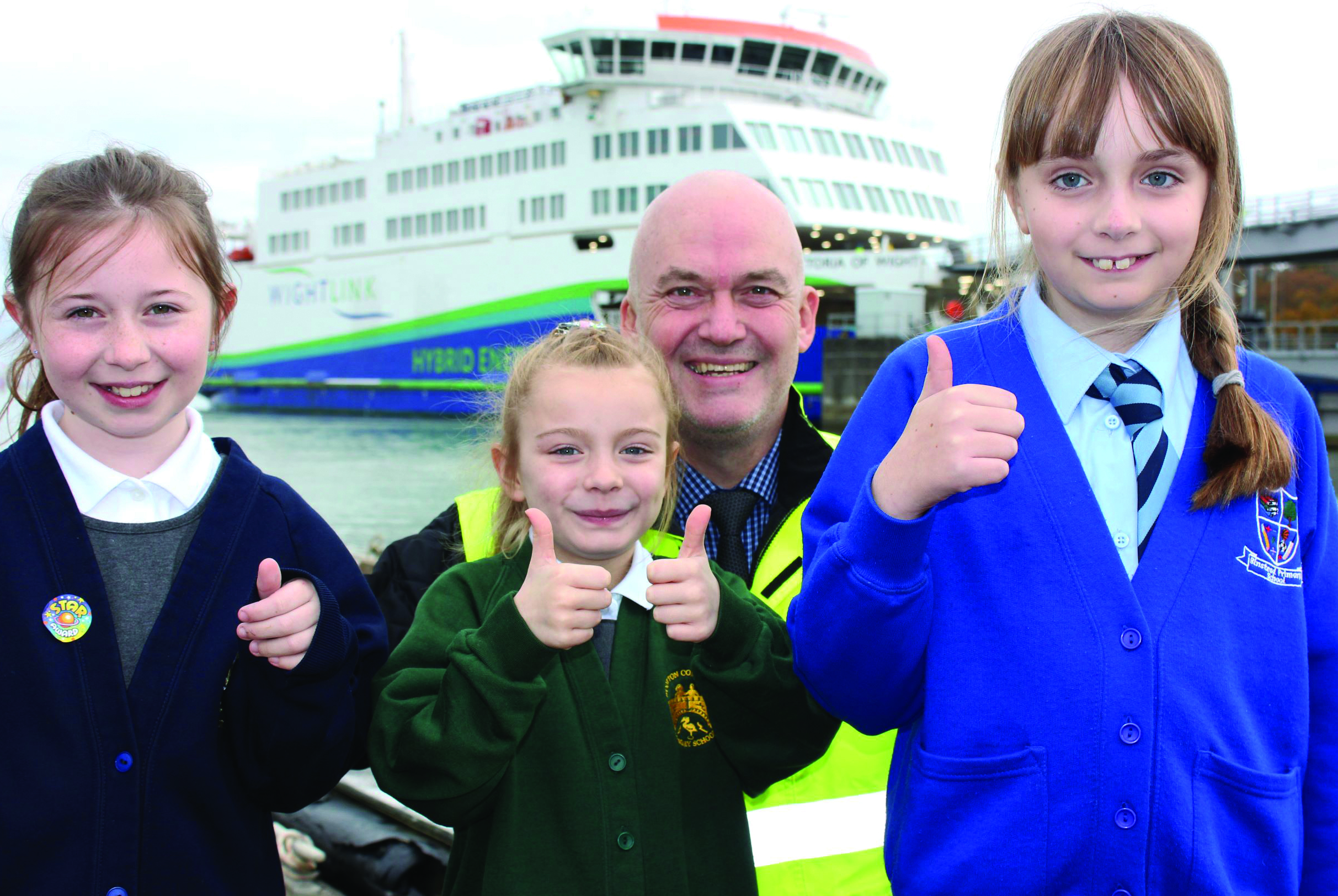 Local schoolchildren Kezia Sheath, Ayra Quayle and Lisa Saunders meet Wightlink's island port operations manager Martin Gulliver at Fishbourne terminal Image: Wightlink Image:Local schoolchildren Kezia Sheath, Ayra Quayle and Lisa Saunders meet Wightlink's island port operations manager Martin Gulliver at Fishbourne terminal Image: Wightlink